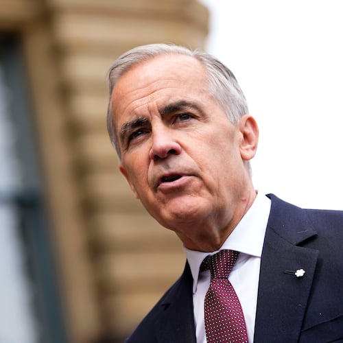 Prime Minister Mark Carney makes a statement outside the Office of the Prime Minister and Privy Council in Ottawa, on Tuesday, July 21, 2026. (Justin Tang/The Canadian Press via AP)
