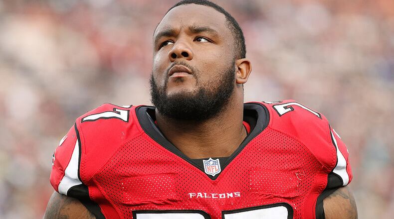 Falcons' Ra'Shede Hageman walks onto the field at Los Angeles Memorial Coliseum on Dec. 11, 2016 during their game against the Rams in Los Angeles.
