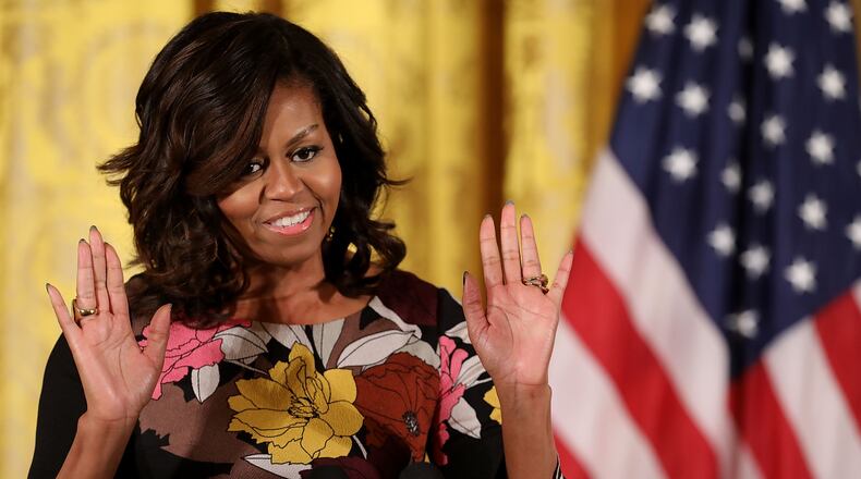 WASHINGTON, DC - NOVEMBER 14: U.S. first lady Michelle Obama delivers opening remarks during the final Joining Forces event in the East Room of the White House November 14, 2016 in Washington, DC. A West Virginia official who referred to Obama as an "ape in heels" is scheduled to return from leave Dec. 23, according to the Charleston Gazette-Mail. (Photo by Chip Somodevilla/Getty Images)