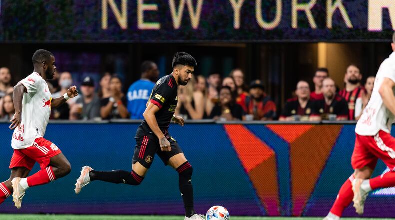 Atlanta United midfielder Marcelino Moreno (10) dribbles against New York Red Bulls Sunday, June 27, 2021, at Mercedes-Benz Stadium in Atlanta. (Jacob Gonzalez/Atlanta United)