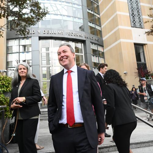 Jason Slothouber, Senior Prosecutor for the Colorado Attorney General's Office, walks outside court after tech giant Meta agreed to pay $17 billion as part of a settlement to end a landmark trial over teen social media addiction on Wednesday, Aug. 26, 2026, in Oakland, Calif. (AP Photo/Noah Berger)