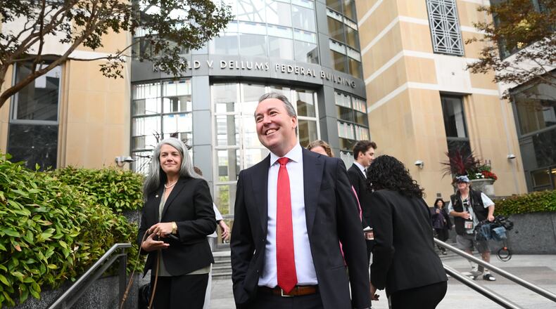 Jason Slothouber, Senior Prosecutor for the Colorado Attorney General's Office, walks outside court after tech giant Meta agreed to pay $17 billion as part of a settlement to end a landmark trial over teen social media addiction on Wednesday, Aug. 26, 2026, in Oakland, Calif. (AP Photo/Noah Berger)