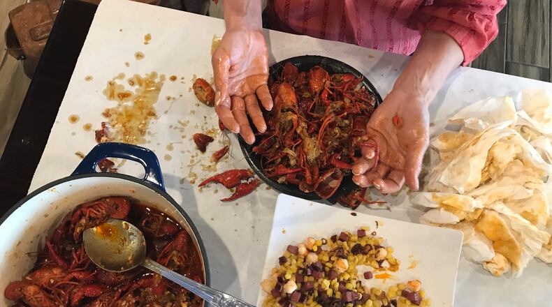 Digging into the crawfish at Kajun Crab on Buford Highway. / Photo by Erica Hernandez