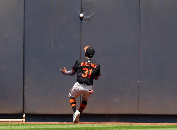 Baltimore Orioles outfielder Cedric Mullins (31) misses a ball hit by New York Yankees' Ben Rice during the fifth inning of a baseball game, Saturday, June 21, 2025, in New York. (AP Photo/Noah K. Murray)