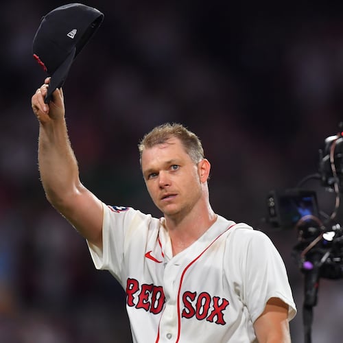 Boston Red Sox's Sonny Gray tips his hat to the crowd as he exits the game after giving up a hit in the eighth inning after pitching seven innings without a hit against the New York Yankees in a baseball game, Sunday, June 28, 2026, in Boston. (AP Photo/Steven Senne)