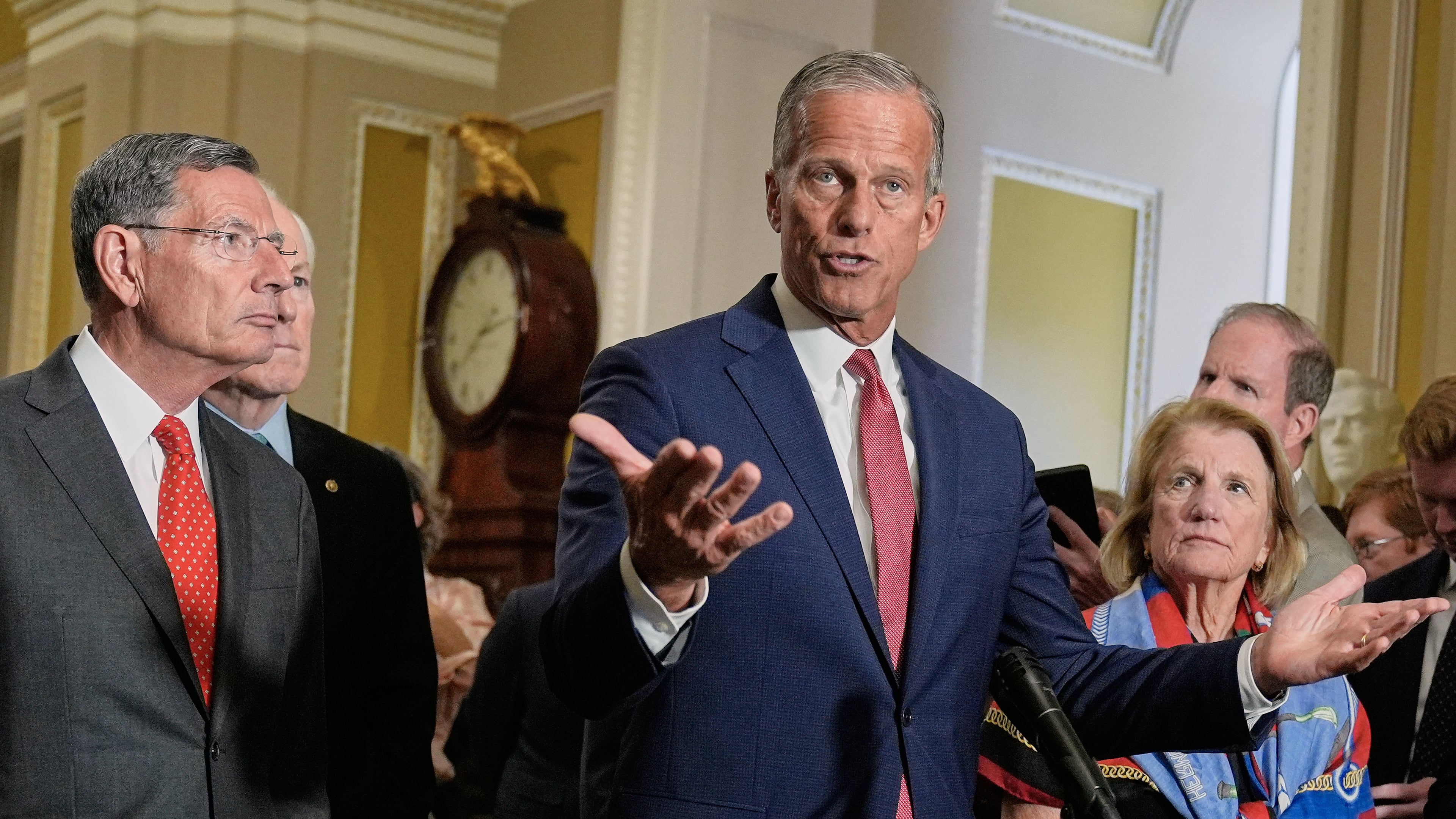 Senate Majority Leader John Thune, R-S.D., center, speaks during a news conference after a policy luncheon at the CapitolTuesday, Sept. 9, 2025, in Washington. (AP Photo/Mariam Zuhaib)