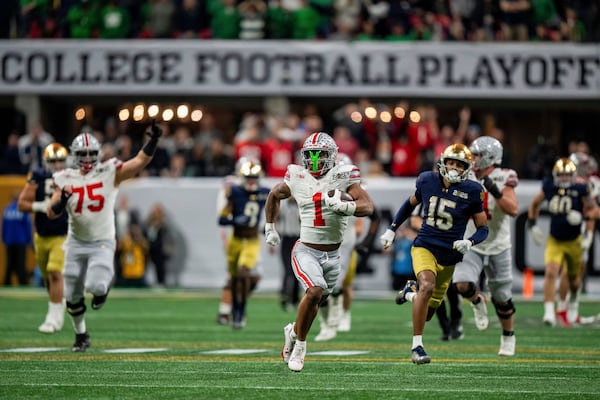 FILE - Ohio State running back Quinshon Judkins (1) runs with the ball against Notre Dame during the College Football Playoff national championship game Monday, Jan. 20, 2025, in Atlanta. (AP Photo/Jacob Kupferman, File)