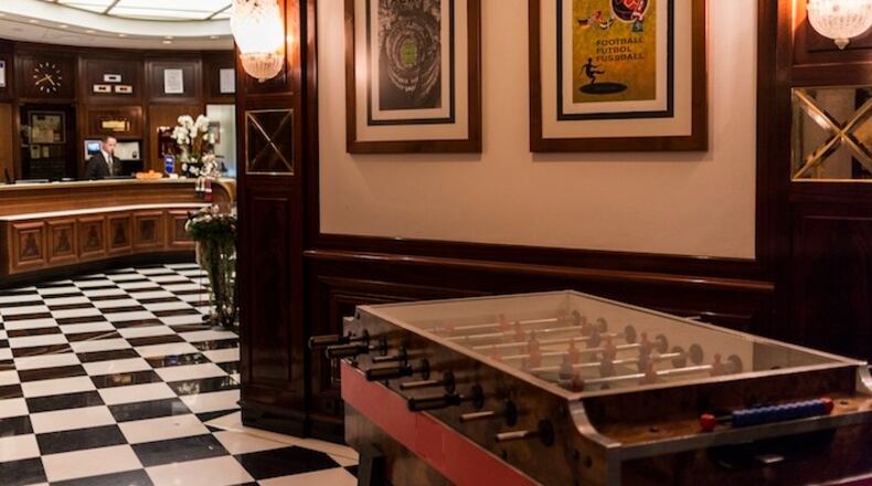 The lobby of the Hotel Ascot, a four-star hotel owned by FIFA, in Zurich, Dec. 15, 2015. Recently rocked by a sweeping corruption case that implicated top officials in bribery and kickback schemes, FIFA, a nonprofit organization, is getting into the residential real estate business with a neighboring building. (Pascal Mora/The New York Times)