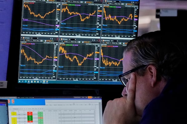 FILE - Specialist Gregg Maloney works at his post on the floor of the New York Stock Exchange, Monday, April 28, 2025. (AP Photo/Richard Drew, File)