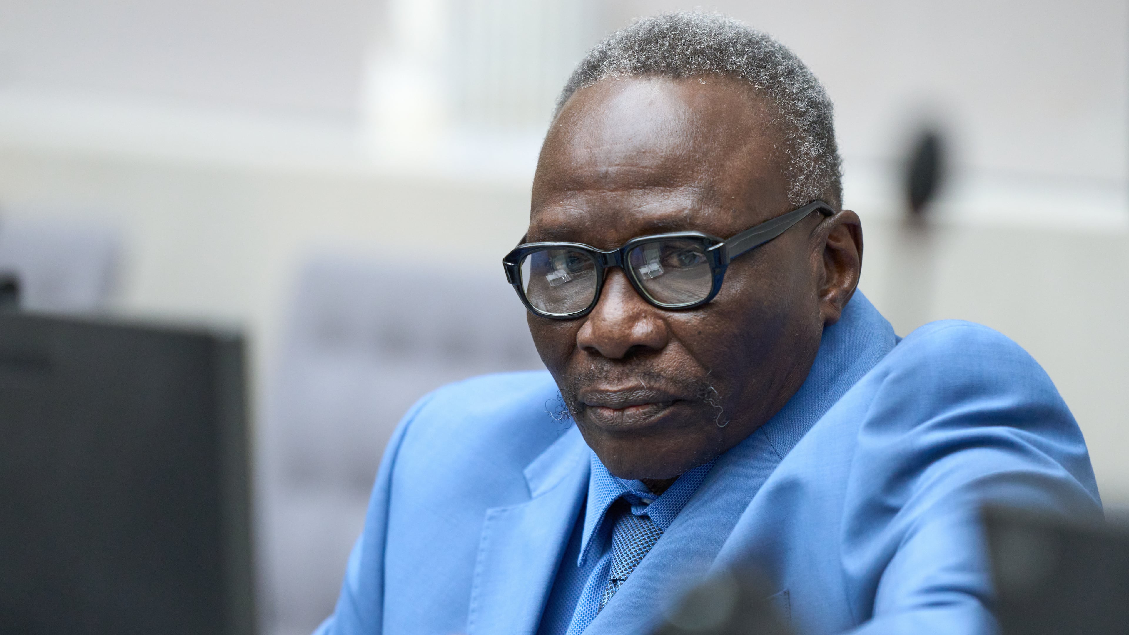 Ali Muhammad Ali Abd al-Rahman, a leader of the Sudanese Janjaweed militia, waits to hear the verdict of the International Criminal Court, ICC, in The Hague, Netherlands, Tuesday, Dec. 9, 2025. (AP Photo/Peter Dejong, Pool)