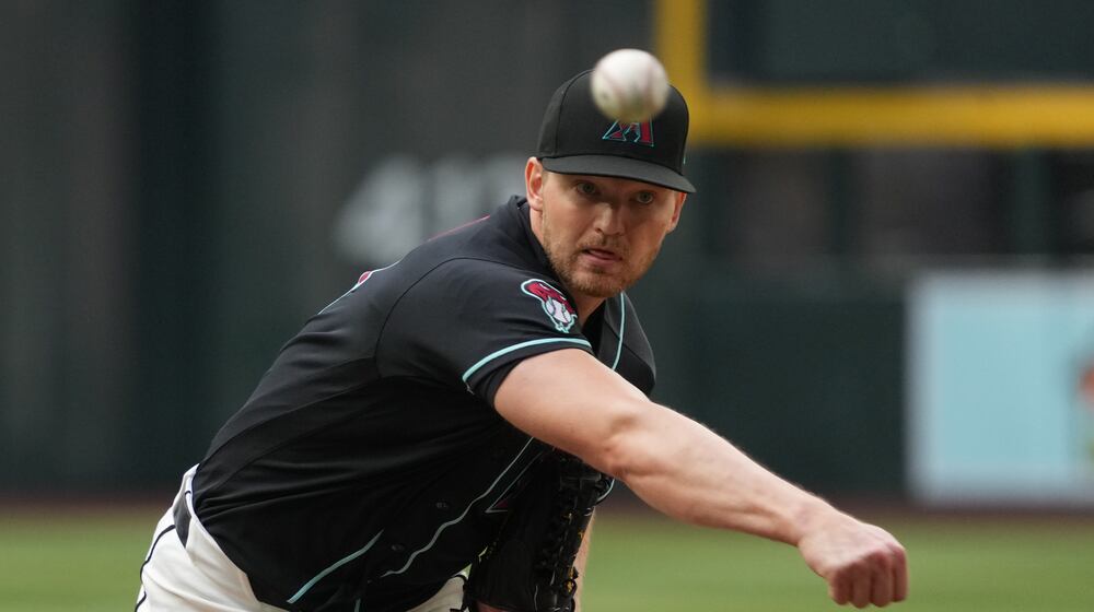 Diamondbacks pitcher Michael Soroka throws against the Braves in the first inning Saturday, April 4, 2026, in Phoenix. Soroka, a former Brave, allowed one run on four hits in five innings to get the win, and four Diamondbacks relievers threw a scoreless inning each to secure the victory. (Rick Scuteri/AP)