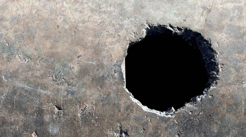 When city officials let potholes go unfixed, one Missouri man decided to draw attention to the road hazards in an unusual way -- by throwing a pothole on his street a birthday party.