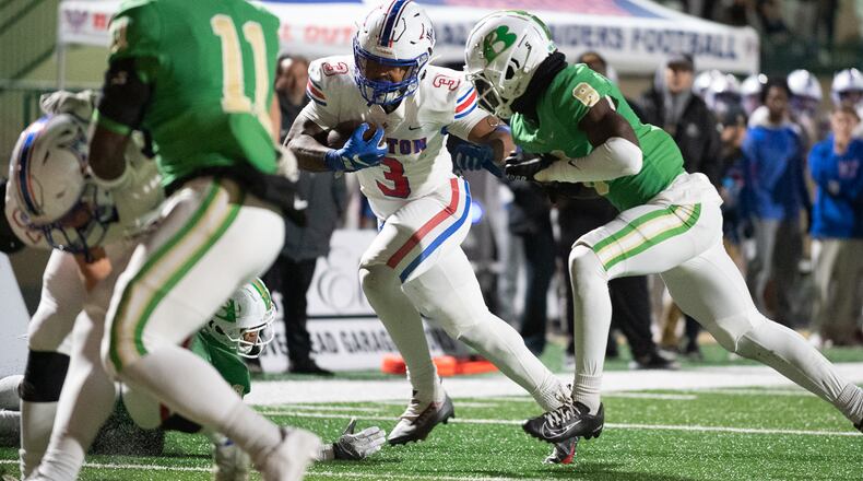 Makari Bodiford, running back for Walton, runs the ball in for a touchddown during the Walton vs. Buford High School Football game on Friday, Nov. 18, 2022, at Buford High School in Buford, Georgia. (Jamie Spaar for the Atlanta Journal Constitution)