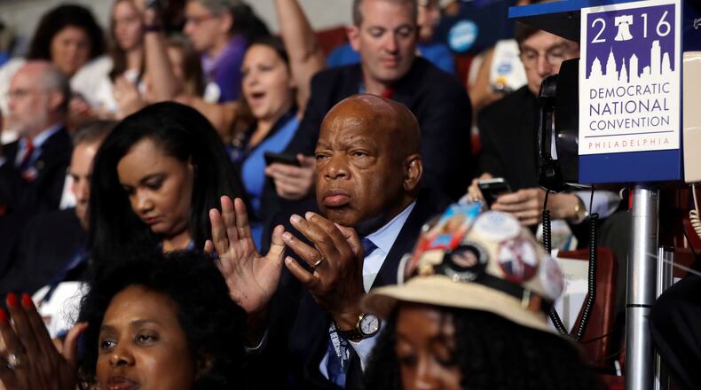 Rep. John Lewis, D-Ga., applauds as he watches during the first day of the Democratic National Convention in Philadelphia , Monday, July 25, 2016. (AP Photo/Matt Rourke)