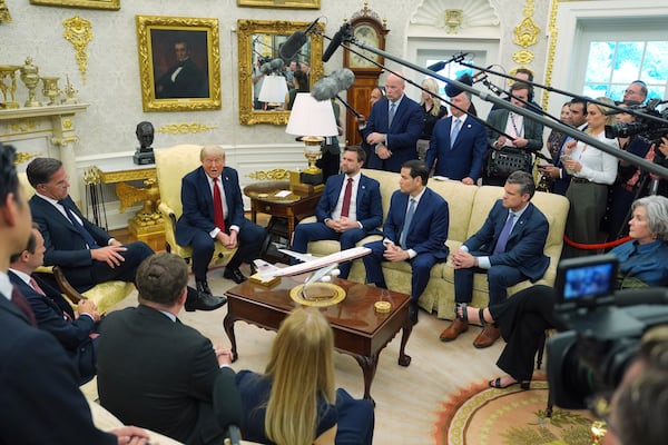 NATO Secretary General Mark Rutte, from left, meets with President Donald Trump as Vice President JD Vance, Secretary of State Marco Rubio, Defense Secretary Pete Hegseth and White House Chief of Staff Susie Wiles listen in the Oval Office of the White House, Monday, July 14, 2025, in Washington. (AP Photo/Evan Vucci)