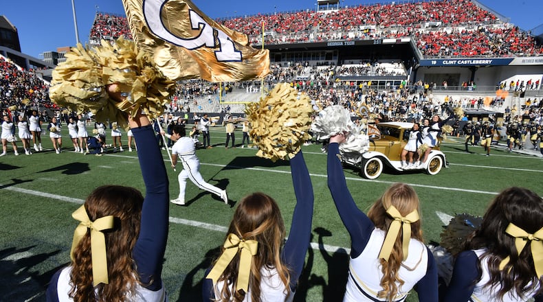 Georgia Tech's Ramblin' Wreck leads players and coaches before the start of the game against Georgia at Bobby Dodd Stadium in Atlanta on Saturday, November 27, 2021. (Hyosub Shin / Hyosub.Shin@ajc.com)