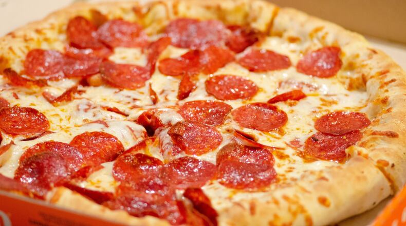 A Wisconsin man was arrrested for paying for his pizza with counterfeit money.