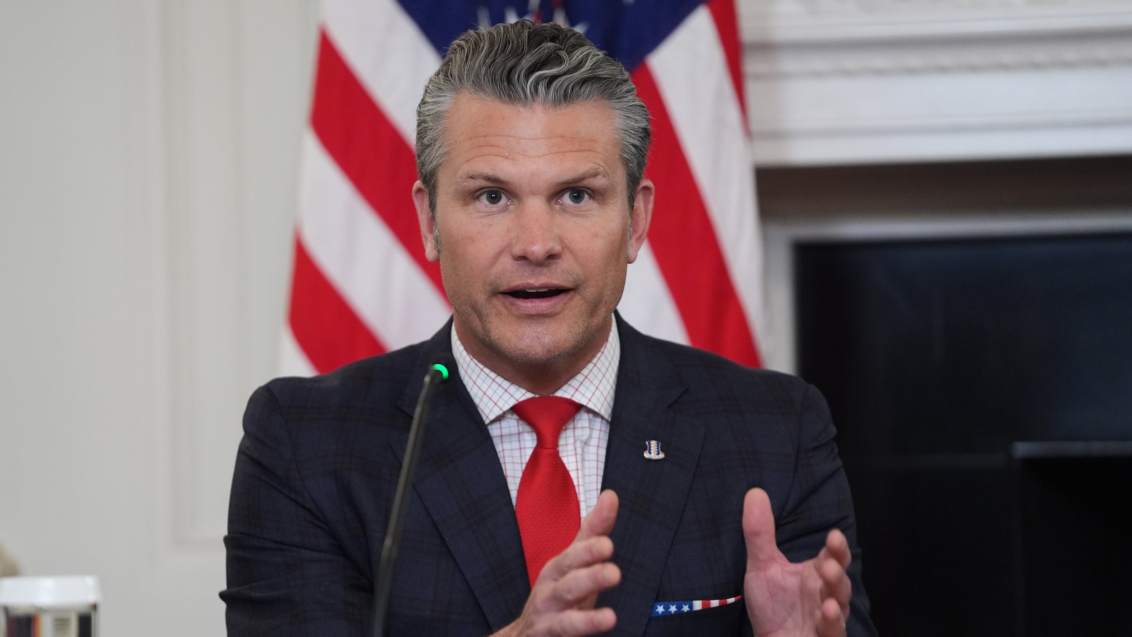 Defense Secretary Pete Hegseth answers a question from a reporter during a roundtable on criminal cartels in the State Dining Room of the White House, Thursday, Oct. 23, 2025, in Washington. (AP Photo/Evan Vucci)