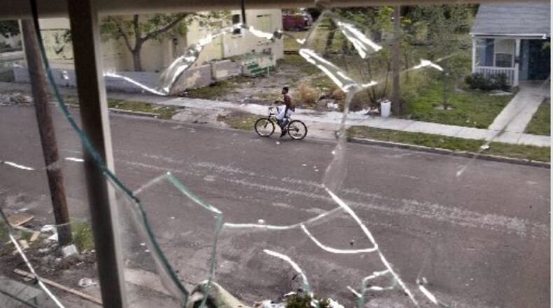 School choice programs that "concentrate benefits only on the poor will continue to yield concentration of the poor," says a North Carolina researcher, who believes impoverished communities would attract middle-class families if school vouchers were available to all residents. (AJC File)