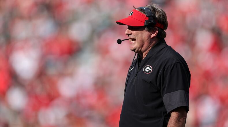Georgia head coach Kirby Smart said that offensive line starters Earnest Greene and Drew Bobo, who missed the Charlotte game, should be back next week against Georgia Tech. (Colin Hubbard/AP)
