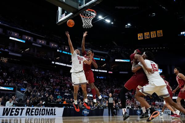 Texas Tech forward Darrion Williams (5) shoots during overtime in the Sweet 16 of the NCAA college basketball tournament game against Arkansas, Thursday, March 27, 2025, in San Francisco. (AP Photo/Godofredo A. Vásquez)