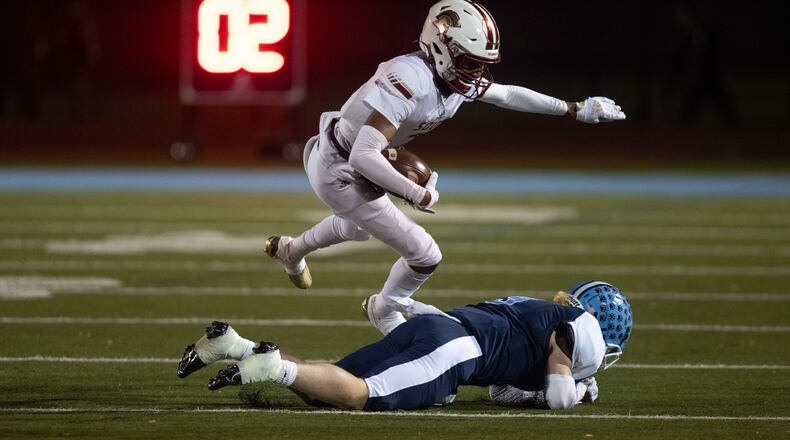 South Paulding's Alek Cooper (2) runs the ball during a GHSA high school football game between Cambridge and South Paulding at Cambridge High School in Milton, GA., on Saturday, November 13, 2021. (Photo/Jenn Finch)