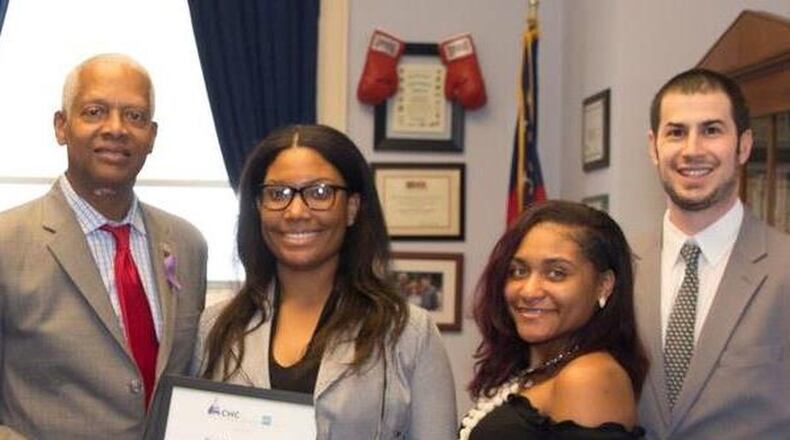 U.S. Rep. Hank Johnson of Georgia (left) meets with Redan High School students Shania Hinds and Alexis Goings and their teacher William Roth during a recent visit to Washington, D.C. The students’ school is in Johnson’s district. CONTRIBUTED