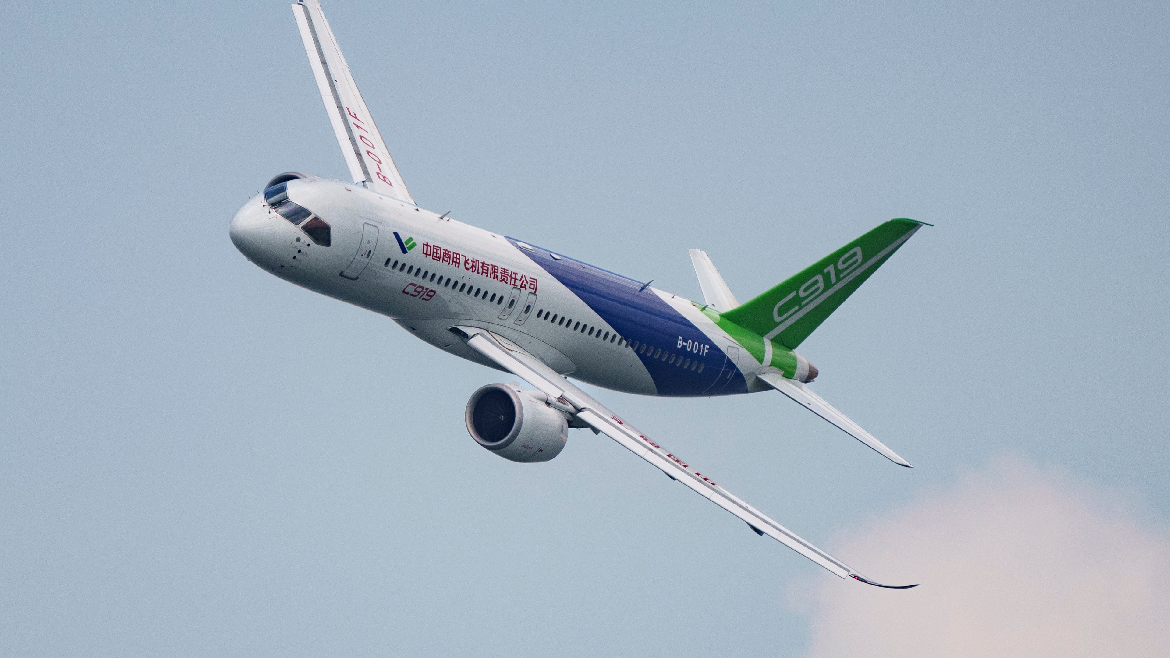 FILE - A COMAC C919 aircraft flies during the first day of the Singapore Airshow in Singapore, Feb. 20, 2024. (AP Photo/Vincent Thian, File)