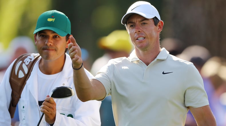 Rory McIlroy reacts to his drive on the 17th hole during his practice round for the Masters at Augusta National Golf Club on Tuesday, April 3, 2018, in Augusta.  Curtis Compton/ccompton@ajc.com