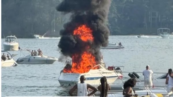 The Perkins' family boat went up in flames July 4 on Lake Lanier, injuring several people, including multiple children. (Courtesy of GoFundMe)