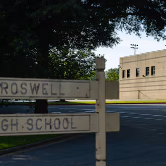 A former Roswell High School teacher and administrative assistant faces a charge of improper sexual contact by an employee or agent after an investigation into her alleged relationship with a 16-year-old student. (Ben Hendren for the AJC)