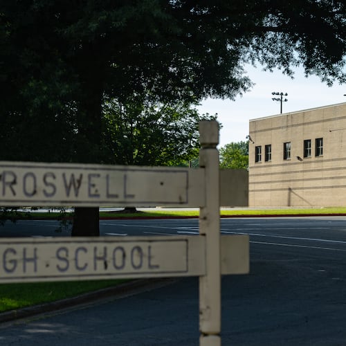 A former Roswell High School teacher and administrative assistant faces a charge of improper sexual contact by an employee or agent after an investigation into her alleged relationship with a 16-year-old student. (Ben Hendren for the AJC)
