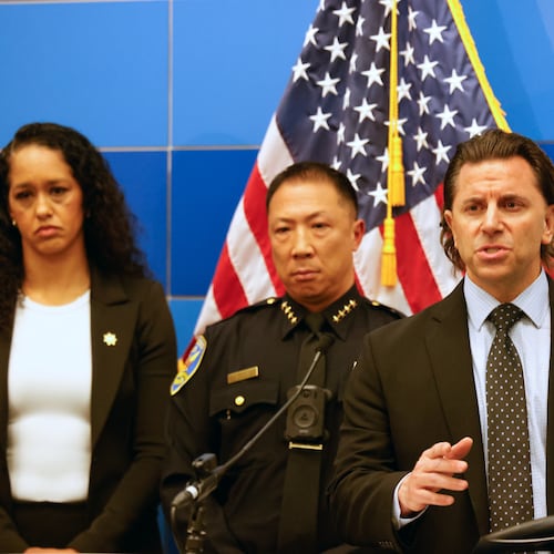 Matt Cobo, F.B.I. San Francisco Acting Special Agent in Charge, right, speaks next to San Francisco Police Chief Derrick Lew during a news conference, Monday, April 13, 2026, in San Francisco. (Lea Suzuki/San Francisco Chronicle via AP)