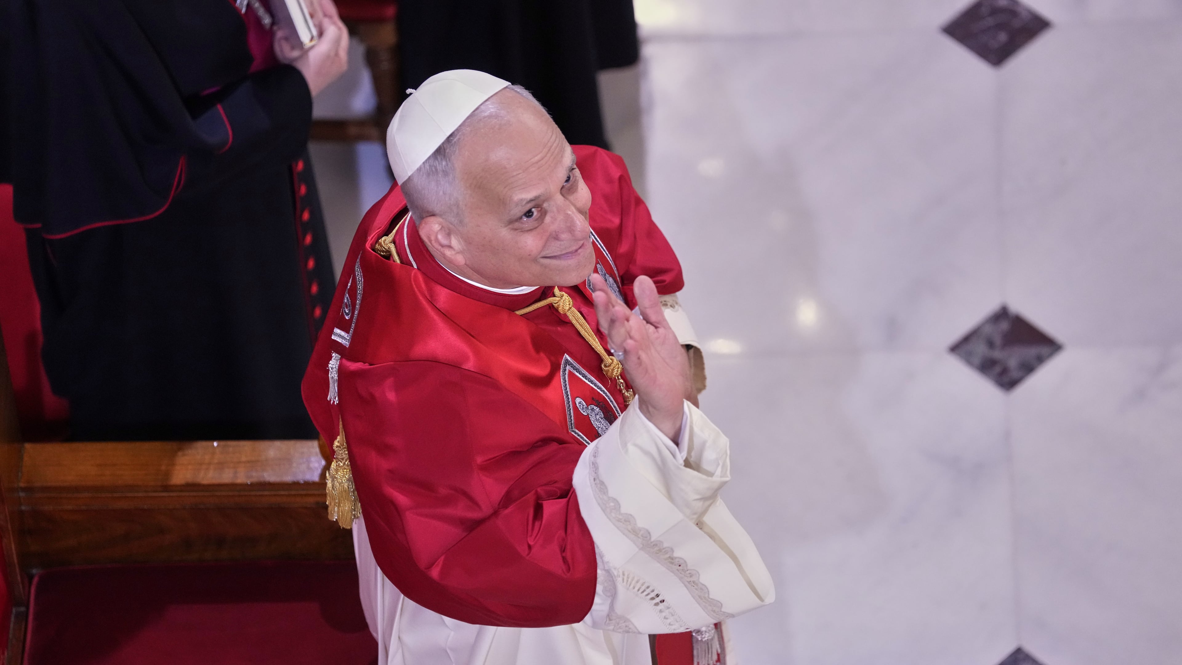 Pope Leo XIV meets the clergy at the Cathedral of the Holy Spirit, in Istanbul, Turkey, Friday, Nov. 28, 2025. (AP Photo/Domenico Stinellis)