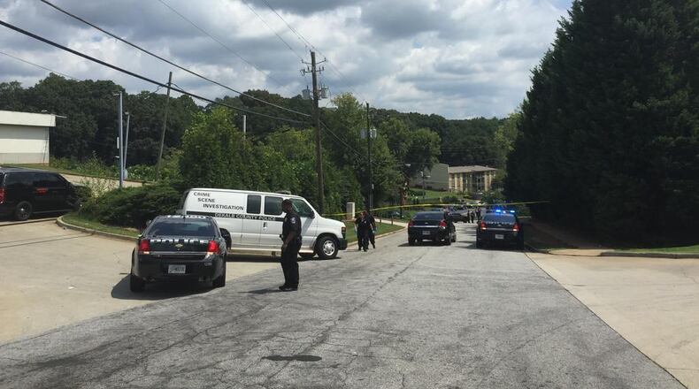 DeKalb County police were investigating Saturday a fatal shooting at the Spring Valley Apartment Homes off Candler Road. (Credit: Channel 2 Action News)