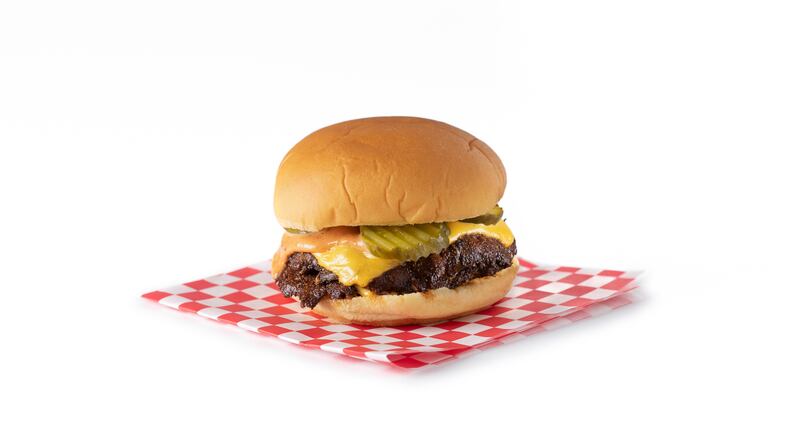 The Billy's Classic at NFA Burger is a double smash burger with American cheese, pickles, mustard and beloved “sassy” sauce. (Courtesy of Erik Meadows)