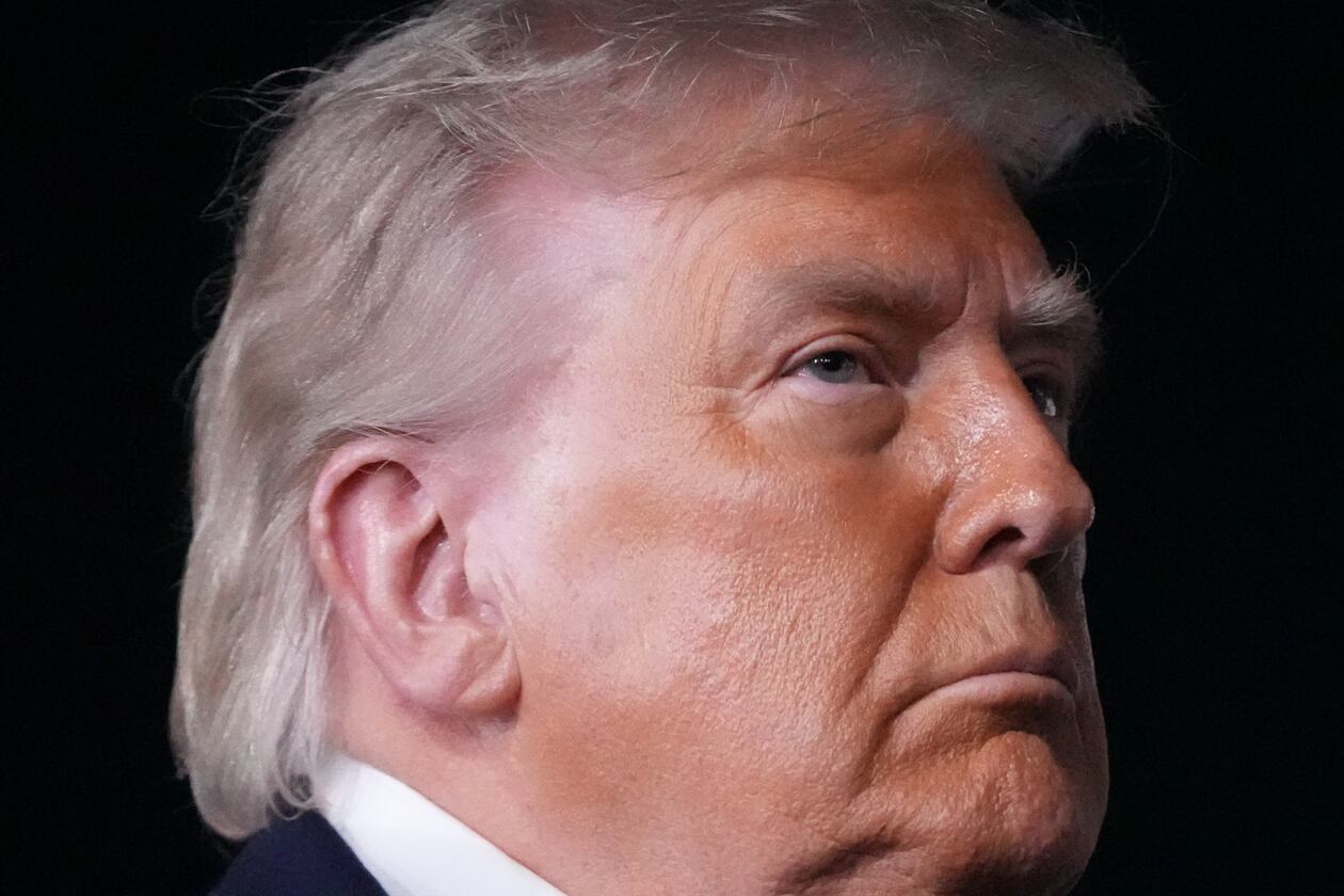 Some in the Wheeler High community are upset by President Donald Trump's visit to the school on Wednesday to promote his new savings plans. One alumna said it's a "slap in the face" to the school's diverse student body. (Mark Schiefelbein/AP)