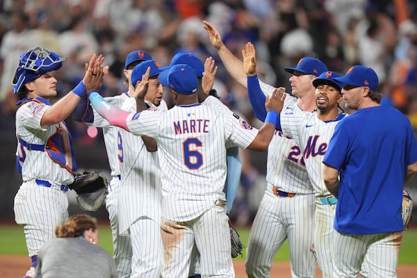 The New York Mets celebrate after a baseball game against the Atlanta Braves Wednesday, June 25, 2025, in New York. (AP Photo/Frank Franklin II)