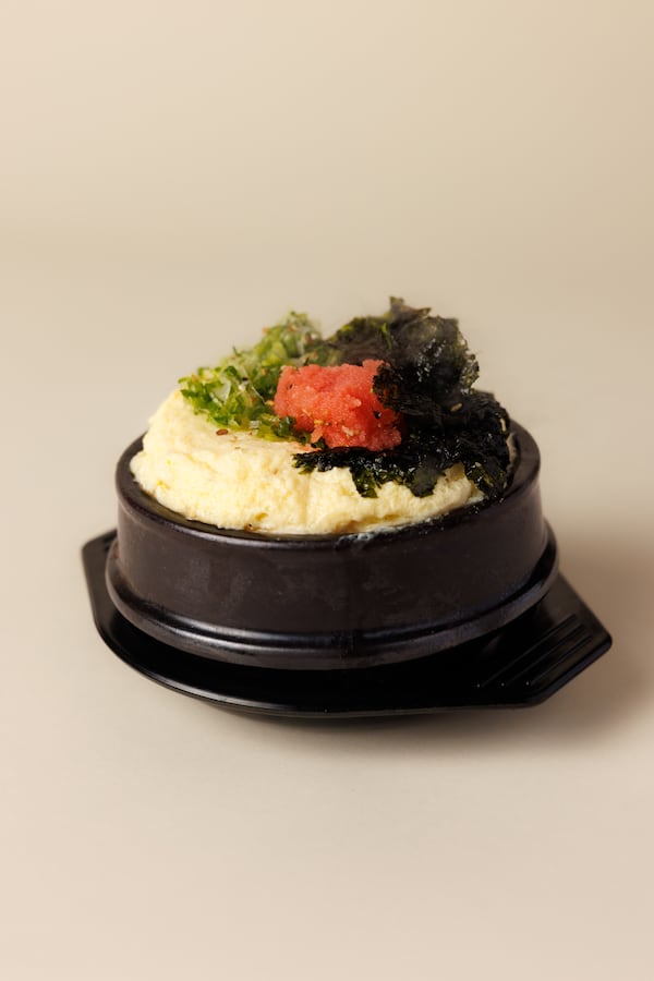 You don't have to be able to pronounce Myeongnanjeot gyeran jjim (steamed eggs in an earthenware pot with salted pollock roe) to order it. (Courtesy of Peter Ho)