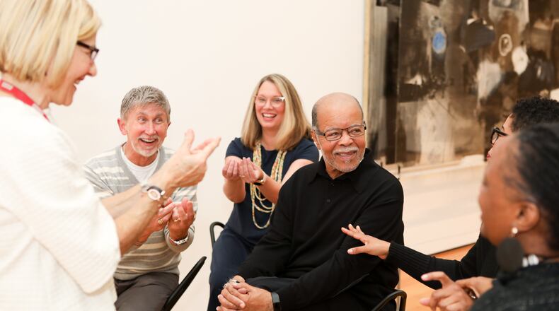 Docent Bryan Brooks (center) leads a Lifelong Learning group in conversation at the High Museum of Art. (Photo by CatMax Photography)