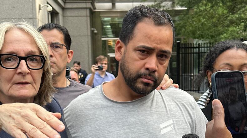 Manuel Hernandez leaves U.S. district court in Manhattan with his lawyer, Amy Gallicchio, on Monday, Aug. 10, 2026, after being charged in the deaths of two people in a boating accident in New York Harbor. (AP Photo/Larry Neumeister)