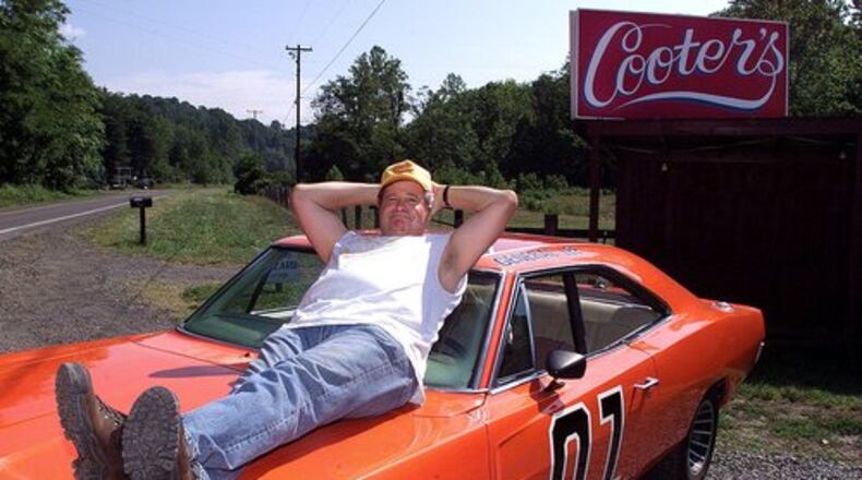 Cooter for Congress? Ben Jones is best known as Cooter the mechanic from "The Dukes of Hazzard." He's seen here reclining atop the General Lee, an orange '69 Dodge Charger outside Cooter's, his roadside store in Sperryville, VA.