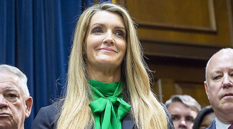 Newly appointed U.S. Senator Kelly Loeffler waits to speak during a press conference in the Governor's office at the Georgia State Capitol Building, Wednesday, December 4, 2019. Georgia Georgia Gov. Brian Kemp appointed Kelly Loeffler to the U.S. Senate to take the place of U.S. Senator Johnny Isakson, who is stepping down for health reasons.