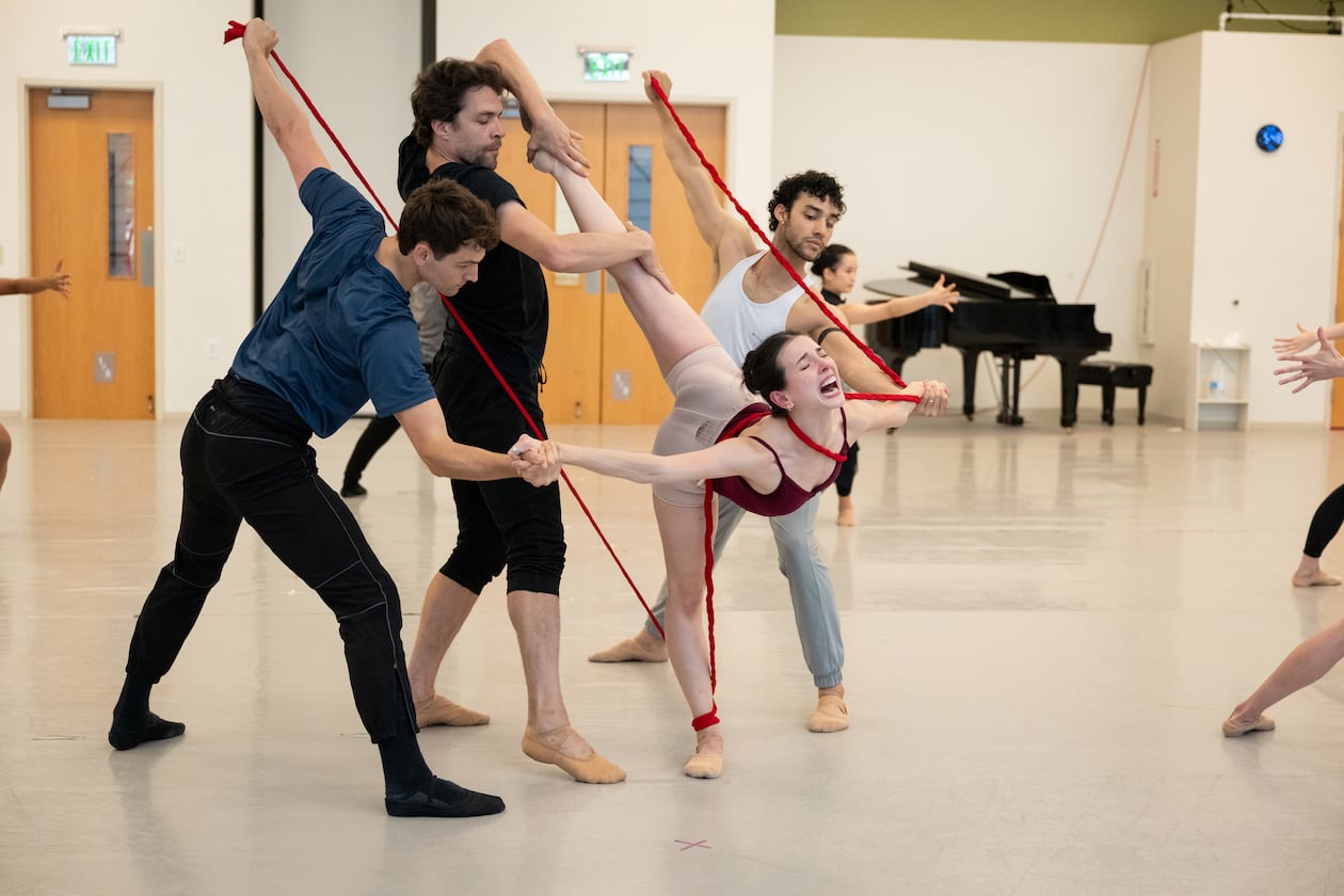 Playing Frida Kahlo, Larissa Capitanio Dal'Santo (center) rehearses with fellow Atlanta Ballet dancers before this weekend's debut of "Frida" at Cobb Energy Performing Arts Centre. (Courtesy of Shoccara Marcus)