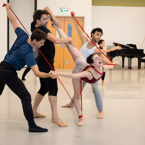 Playing Frida Kahlo, Larissa Capitanio Dal'Santo (center) rehearses with fellow Atlanta Ballet dancers before this weekend's debut of "Frida" at Cobb Energy Performing Arts Centre. (Courtesy of Shoccara Marcus)