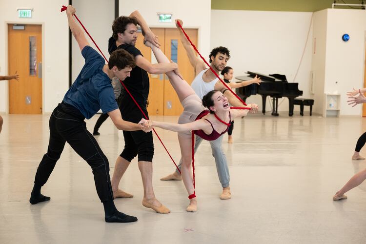 Playing Frida Kahlo, Larissa Capitanio Dal'Santo (center) rehearses with fellow Atlanta Ballet dancers before this weekend's debut of "Frida" at Cobb Energy Performing Arts Centre. (Courtesy of Shoccara Marcus)