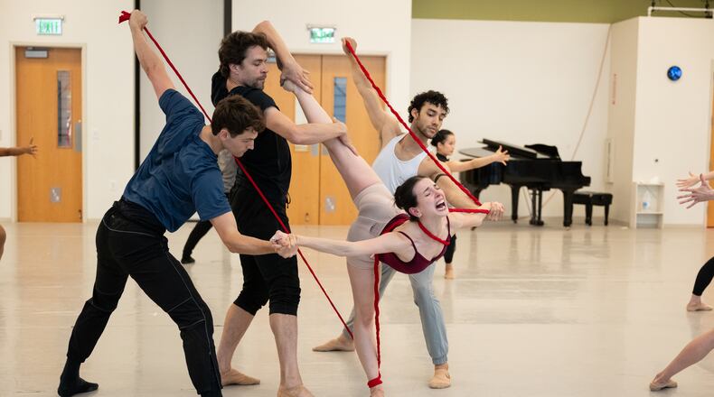 Playing Frida Kahlo, Larissa Capitanio Dal'Santo (center) rehearses with fellow Atlanta Ballet dancers before this weekend's debut of "Frida" at Cobb Energy Performing Arts Centre. (Courtesy of Shoccara Marcus)