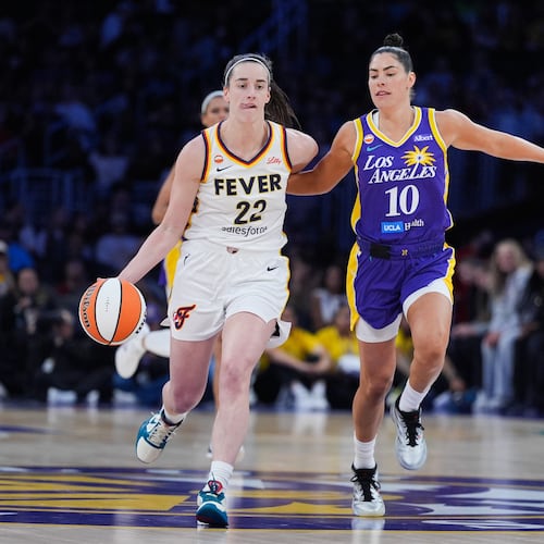 Los Angeles Sparks guard Kelsey Plum (10) pressures Indiana Fever guard Caitlin Clark (22) during the first half of a WNBA basketball game Wednesday, May 13, 2026, in Los Angeles. (AP Photo/Jae C. Hong)