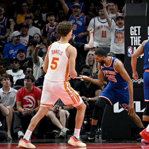 New York Knicks guard/forward Mikal Bridges reacts after dunking the ball during the first half of Game 6 of a first-round NBA playoff series at State Farm Arena on Thursday, April 30, 2026, in Atlanta. (Hyosub Shin/AJC)