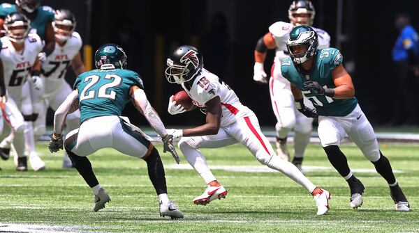 Falcons wide receiver Calvin Ridley makes a first down reception on the game's opening drive against the Philadelphia Eagles Sunday, Sept. 12, 2021, at Mercedes-Benz Stadium in Atlanta. (Curtis Compton / Curtis.Compton@ajc.com)